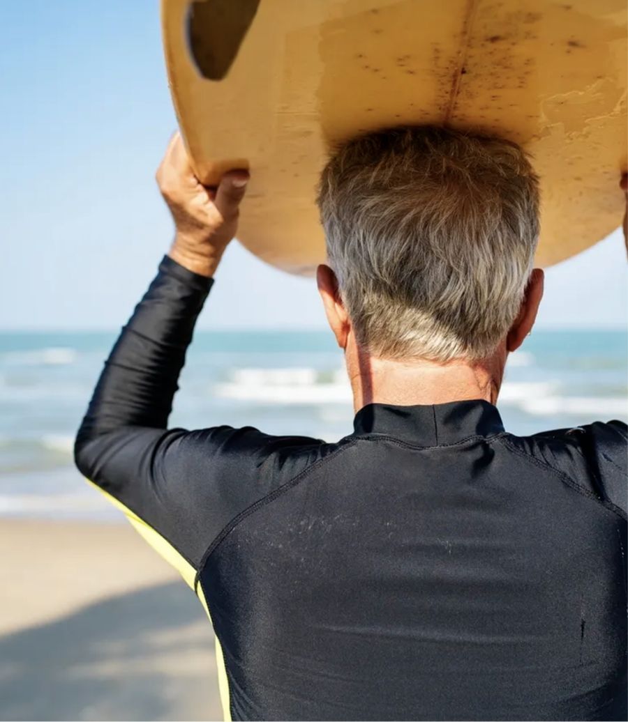 man with surf board