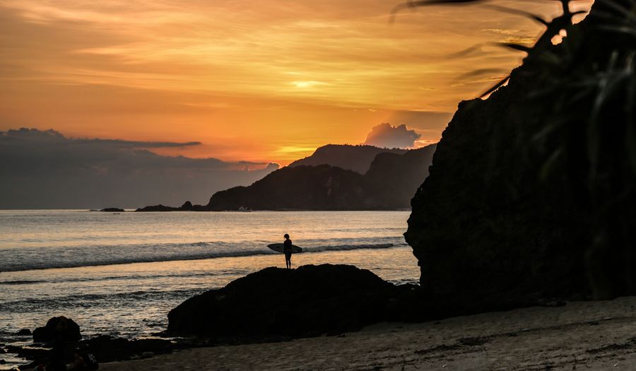 women on surf board